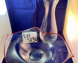 Lot 5130. $195.00   Kissy Kissy, Very Unique Lip Bowl 15"L x 11" W x 5"H , Lip Vase 13.5"h x 8"w x 5.5"deep. Both of these are crystal. There are numbers etched (59697 on the bowl & 59695 on the vase). Kosta Boda? 