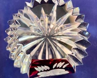 Lot 5132. $45.00  Ruby and Clear Paperweight Cut glass, nice and sharp (3" W x 3" H x 2" D), Ruby and Clear Crystal Handled Basket (7.5". H x 8" W x 4.5" D), Art Glass Paperweight.