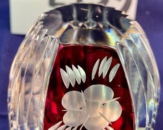 Lot 5132. $45.00  Ruby and Clear Paperweight Cut glass, nice and sharp (3" W x 3" H x 2" D), Ruby and Clear Crystal Handled Basket (7.5". H x 8" W x 4.5" D), Art Glass Paperweight.
