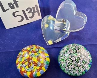 Lot 5134. $45.00  2 Murano Piu Millefiori Paperweights each 2.5" W x 2" H, and a double heart glass accent piece 4" W x 4" D x 2" H