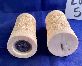 Lot 5137. $18.00  Set of faux bone carved Asian salt and pepper shaker. Intricate design. Pepper is missing the internal grinder. 5.5" H x  2" W
