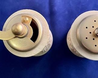 Lot 5137. $18.00  Set of faux bone carved Asian salt and pepper shaker. Intricate design. Pepper is missing the internal grinder. 5.5" H x  2" W