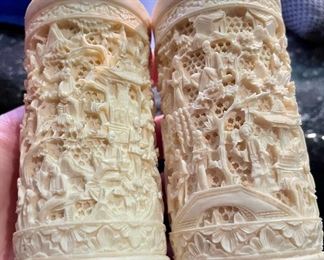 Lot 5137. $18.00  Set of faux bone carved Asian salt and pepper shaker. Intricate design. Pepper is missing the internal grinder. 5.5" H x  2" W