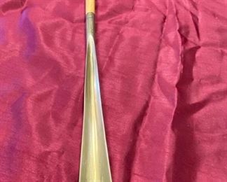 Lot 5115.  $85.00. Brown Leather "The Shoe Horn" Saddle Bag. Used to go over a Suitcase for additional storage. 2 zipper pockets and 1 zipper compartment. 16" W  x 12" H.  In addition we have included a  solid brass shoe horn. 16" W  x 12" H