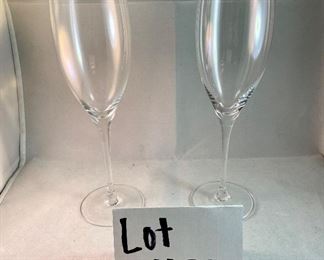 Lot 5196. $180.00 for one set of 6 Reidel Vintage Champagne Flutes, retail for $95/flute. Sommeliers line. Handmade in Austria #400/28. 9.25"tall and 2.25"wide. In box. 