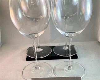 Lot 5197. $72.00. Set of 4 Reidel Wine glasses	9.75"t x 2.5" at the opening, with a box, the box says "Rioja" but not sure it matches the glasses. 