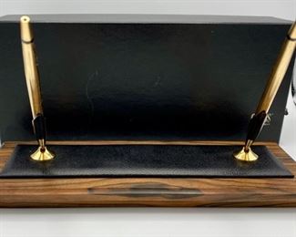 Lot 5228. $1,995.00  VERY RARE Vintage Cross Solid 14k Gold (41.1 Grams) Double Base Desk Set #5286 Macassar Walnut & Leather, 14k Gold Pen & Pencil. 41.1 grams of 14K Gold. This is unique in that it is New and with original box set as opposed to Pen and Pencil alone.  We are simultaneously running this on eBay as well.  