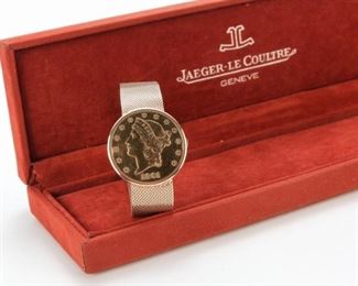 JAEGER-LE COULTRE 20 DOLLAR GOLD COIN WATCH.
Swiss, 4th Qtr - 20th century. Jaeger LeCoultre 18K yellow gold wristwatch inserted in a U.S. 1891 Liberty $20 gold coin. Double case, coin opening with a push-piece to the band, three-body hinged inner case. Model #4430-21, serial # 1410810, manual wind movement. 18K yellow gold mesh integrated bracelet with fold-over clasp, overall length approx. 7.75". Total weight 70.4gr. Accompanied by Jaeger-LeCoultre box and appraisal stating retail value of $14,540.00 (dated 4/30/15).