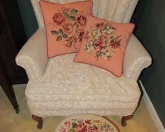 Down filled chair with embroidered pieces