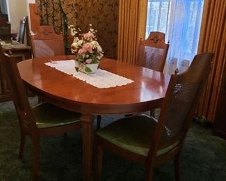 Vintage MCM Mid Century Solid wood with burled accents China Cabinet & Hutch, Dining Room Table w/3 Leafs & 6 Lenore chair Co. Cane back, green padded fabric seat Chairs (2 arm & 4 side) Table 64"W x 44"D x 29"H leafs 12"W each China cabinet 60"W x 17"D x 765.25"H Entire Set WAS $1995 NOW $1695