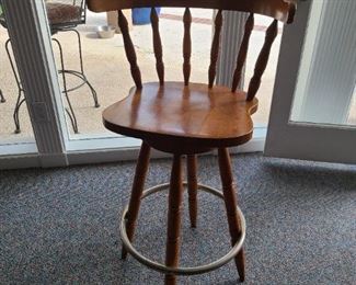 Solid wood swivel bar stools 
We have three