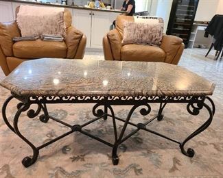 Marble top wrought-iron coffee table. Very heavy & sturdy