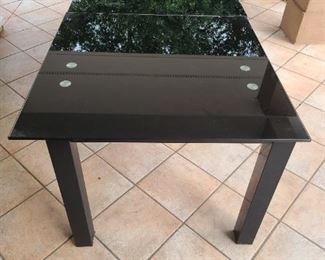 Another view of black glass top table