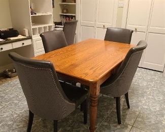 Kuka brand leather and cloth chairs with solid wood breakfast/dining table = 4 chairs
*Extra matching chair is also available