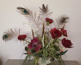 Floral arrangement w/peacock feathers