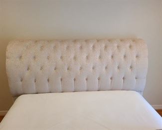 Close up of  cushioned headboard 