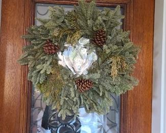 Christmas tree branch and pine cone wreath