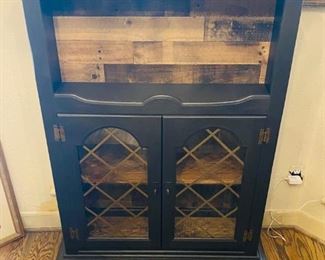 Unique multi-stained upside down double doored china cabinet