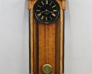 A 19th century E. Howard model 59-8 wall regulator.  8-day weight driven time only movement with 8" Black dial, gilded Roman numerals and hands.  Walnut case with Ebonized detail, pediment top with turned finials over a single long door with turned quarter columns and Bird's Eye Maple interior weight baffle over a shaped drop with turned and carved drop finials.  Old restored finish with slight wear, replaced pendulum bob, lacks tie down clip, running when cataloged.  46" high overall.  ESTIMATE $8,000-12,000
