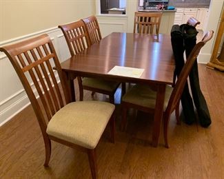 #10 Lexington Cherry farmhouse diningroom table with 6 chairs and 2 leaves and silver ware drawers on each end 72-108x42x30 $2,500.00