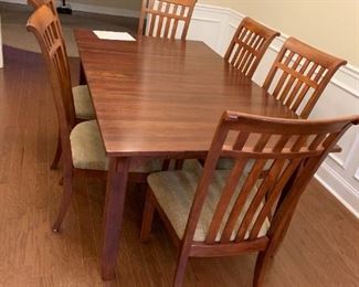 #10 Lexington Cherry farmhouse diningroom table with 6 chairs and 2 leaves and silver ware drawers on each end 72-108x42x30 $2,500.00