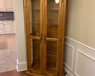 #11 light wood display cabinet with 5 glass shelves with inside light 30x13x77 $225.00