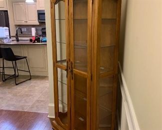 #11 light wood display cabinet with 5 glass shelves with inside light 30x13x77 $225.00