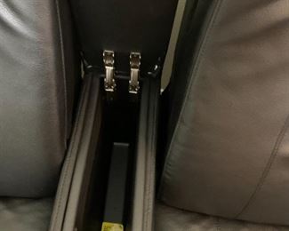 #14 Tranquil ease Raffel system double electric recliner theater love seat with 2 cup holder computer docking plug, flip up storage compartment 66 wide $600.00
storage unit in sofa