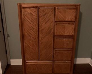 #20 oak chest of drawers with 2 doors and 6 drawers and a place to make it a armoire bar or shelves 40x18x57 $120.00