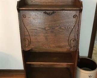 Beautiful oak drop front desk. Primitive crocks throughout house