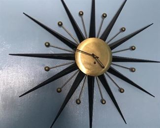 Look at this vintage clock. WE are looking for the key.