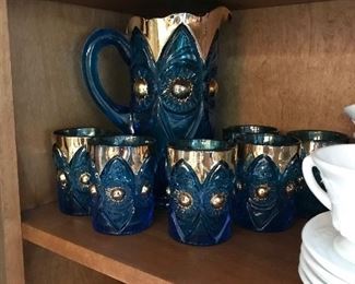 This is a one of a kind pitcher and glass et. Deep turq and gold SEt