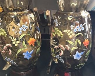 Love these Glass and Enamel painted Vases No candle holders. On stands which are attached.