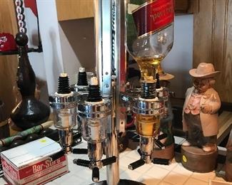 Now here is a Bar Dispenser - holds 6 bottles and adjusts to size.