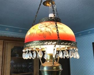 This is a beautiful hand painted lamp with glass prisms. Electrician has to remove lamps.