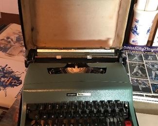 Vintage Olivette Letter 32 with Blue Case - Made in Italy. Great condition. I bet wonderful stories written on this typewriter.
