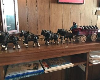 Cast Iron Beer Wagon with 12 Kegs, 8 Clydesdales, 2 drivers and dog. Excellent condition.