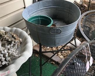 Galvanized tub on stand.