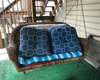 Love this wicker swing. Heavy duty.