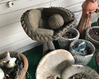 Look at this baseball glove and ball bird bath. Its a beauty.