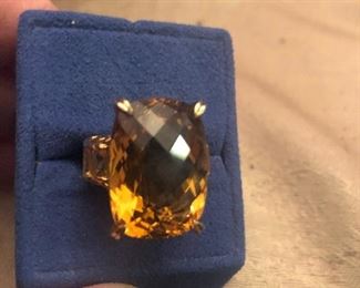 boom !!  925 -gold plated bling bling ring  stone is great not sure  if its a real  but its bling all over  $45