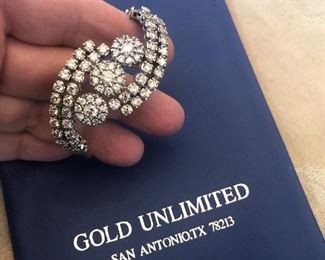 just for fun throwing this bad boy in the mix- its a custom over 6 carat  white gold diamond bracelet- it will only fit a small-med wrist -such is life- this  paperwork -was done nov. 2020 so its very current value is $12000 plus - my consignor is selling  for $8000  I WILL NOT HAVE THIS PIECE WITH ME EVER W/OUT THE  GUARD - SERIOUS POSSIBLE BUYERS ONLY- NOT showing   it for fun - but its a cool unique piece for someone who loves diamond bling  