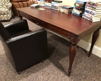 Bombay desk, VHS tapes and rolling desk chair