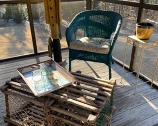 VINTAGE LOBSTER TRAP FROM MAINE, VINTAGE WICKER CHAIR AND TALL WOODEN FISHERMAN.