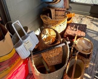 ASSORTMENT OF BASKETS ON THE SCREENED PORCH