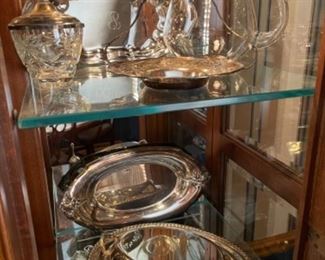 LOTS OF SILVER PLATE IN DINING ROOM CHINA CABINET