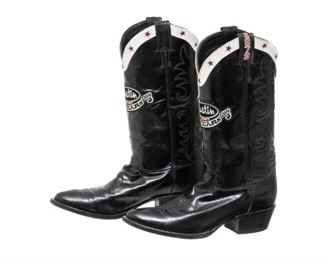 	
125th Anniversary Special Edition Justin Boots
125th Anniversary special edition Justin Boots, patent leather with embroidery detail, marked 1879 and 2004
Size 9D