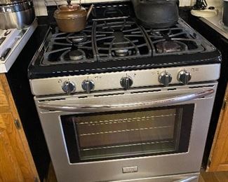 Less than 1 year old gas range