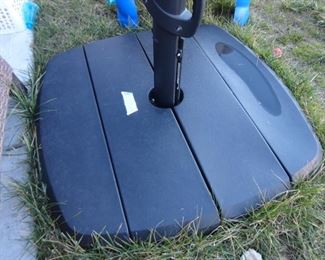 Base of the umbrella can be either water or sand (bring help to move)