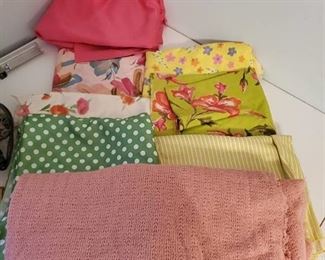 8 Different Bundles of Floral and Colorful Fabric